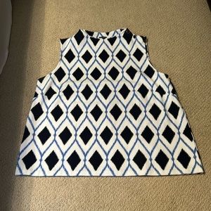 Navy and blue sleeveless Talbot’s top with buttons on one side of the shoulder